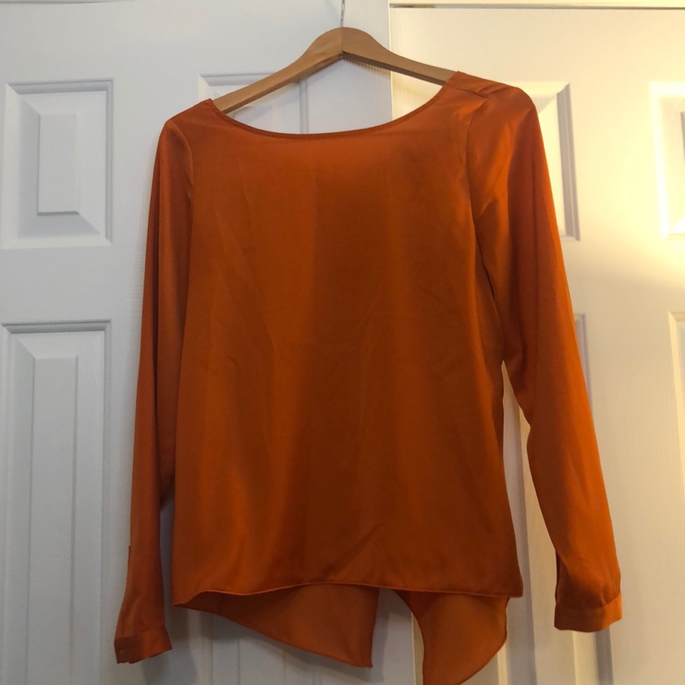 Limited orange silk-like blouse